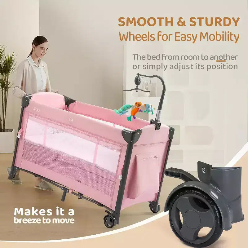 JOYMOR Baby Bedside Bassinet, Baby Bassinet, Pack n Play Convert Playpen, Quick Foldable Travel Bed, Wheels & Brake, Carry Bag for Boys Girls (Pink)