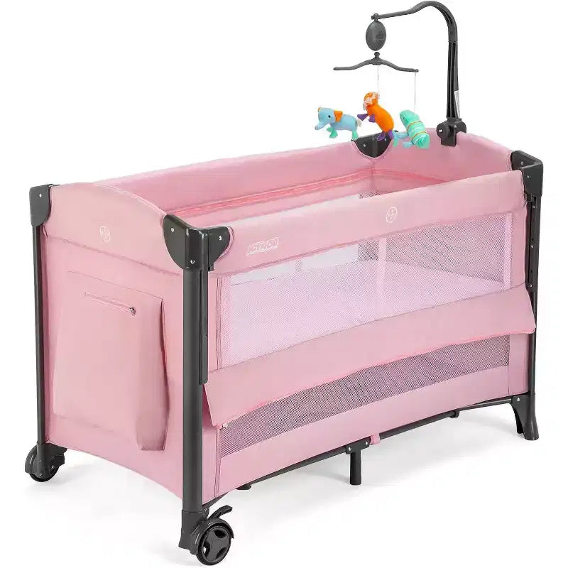 JOYMOR Baby Bedside Bassinet, Baby Bassinet, Pack n Play Convert Playpen, Quick Foldable Travel Bed, Wheels & Brake, Carry Bag for Boys Girls (Pink)